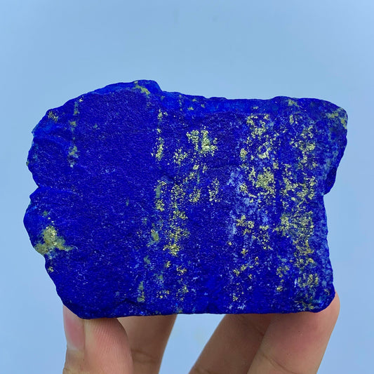 Opaque lapis lazuli next to faceted sapphire