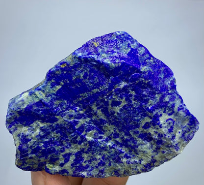 Raw Lapis lazuli crystal specimen with deep blue and white marbled patterns