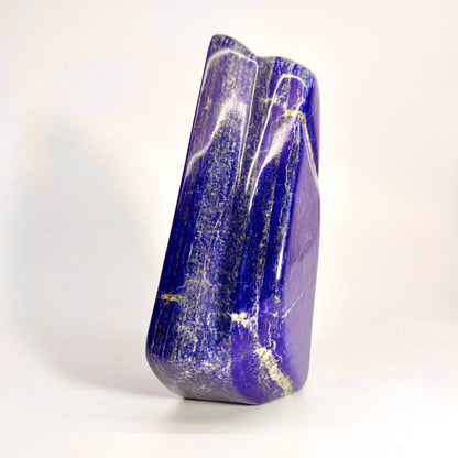 1200g polished Lapis Lazuli with Pyrite inclusions
Front face of large Afghan Lapis Lazuli centerpiece
Close view of Pyrite veining on polished surface
Reflective polished finish on deep blue Lapis Lazuli