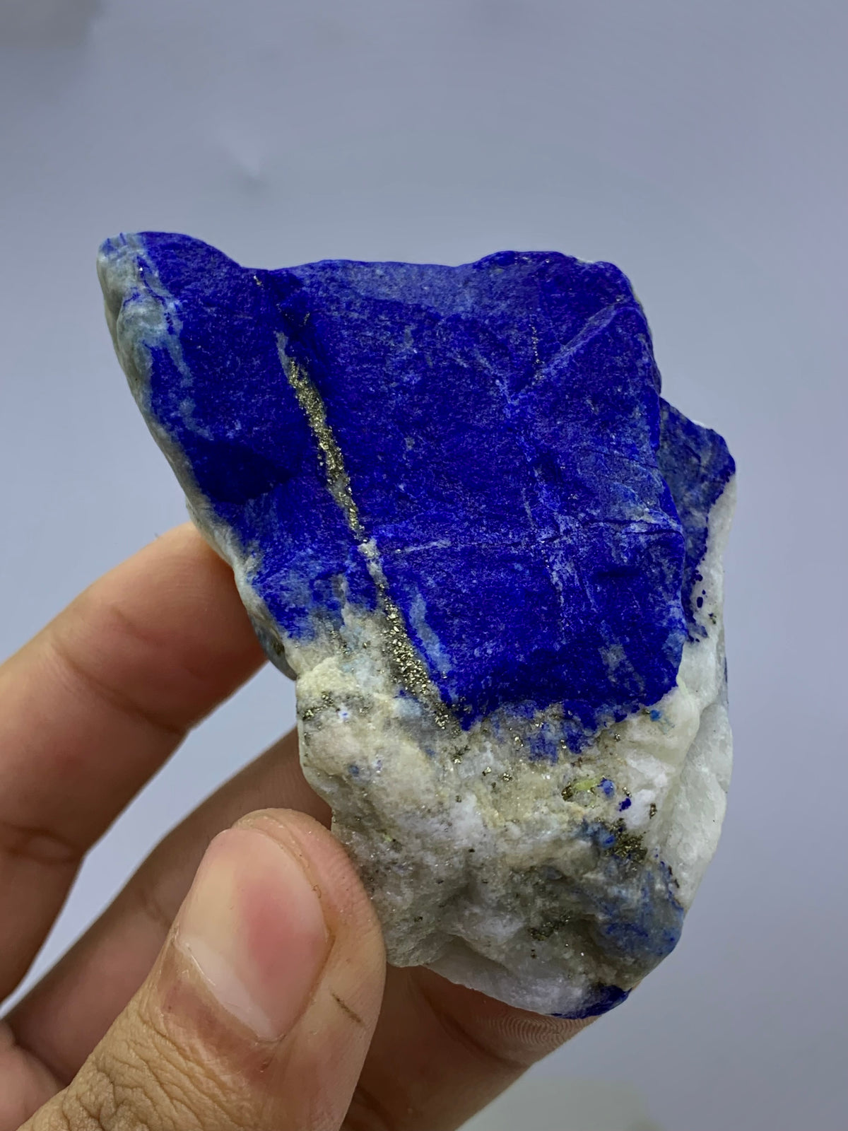Afghan Lapis Lazuli specimen, side profile view
124g raw Lapis Lazuli specimen with Pyrite veins
Lapis Lazuli rough specimen, front angle, royal blue color