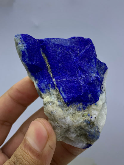 Afghan Lapis Lazuli specimen, side profile view
124g raw Lapis Lazuli specimen with Pyrite veins
Lapis Lazuli rough specimen, front angle, royal blue color