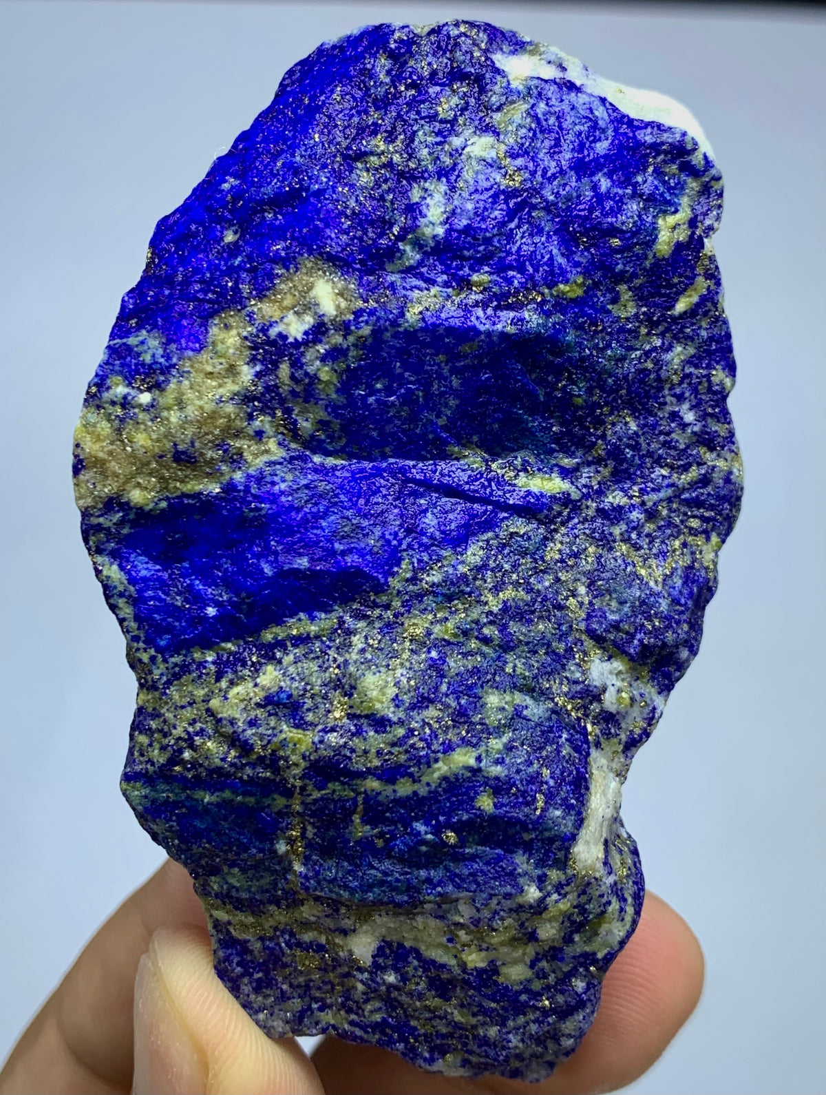 Close-up of Lazurite matrix showing indigo blue tone
Lapis Lazuli well-proportioned specimen, top view
Raw Lapis Lazuli showing natural Calcite pockets
Afghan Lapis Lazuli specimen, side profile view