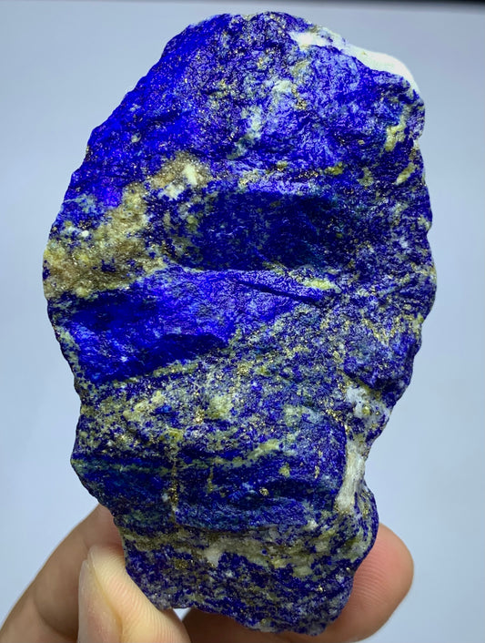 Close-up of Lazurite matrix showing indigo blue tone
Lapis Lazuli well-proportioned specimen, top view
Raw Lapis Lazuli showing natural Calcite pockets
Afghan Lapis Lazuli specimen, side profile view