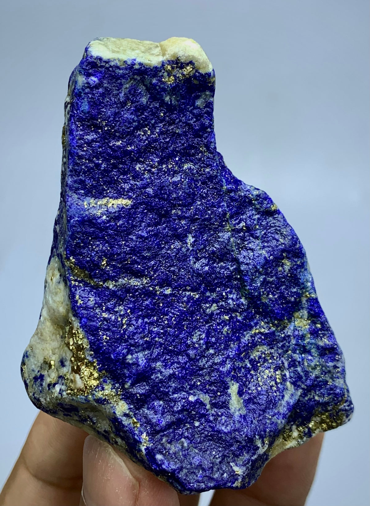170g unpolished Lapis Lazuli with Pyrite veining
Front face of near-cube Afghan Lapis Lazuli
Close view of Pyrite specks on raw Lazurite
Natural textured surface of Badakhshan Lapis Lazuli