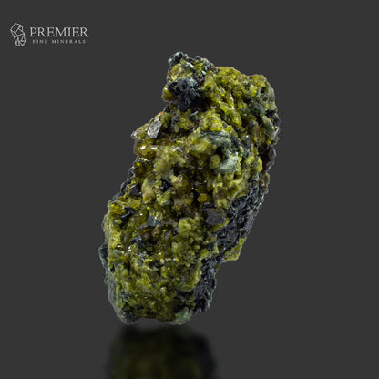 Vesuvianite, Diopside, Rainbow Magnetite and Biotite Cluster