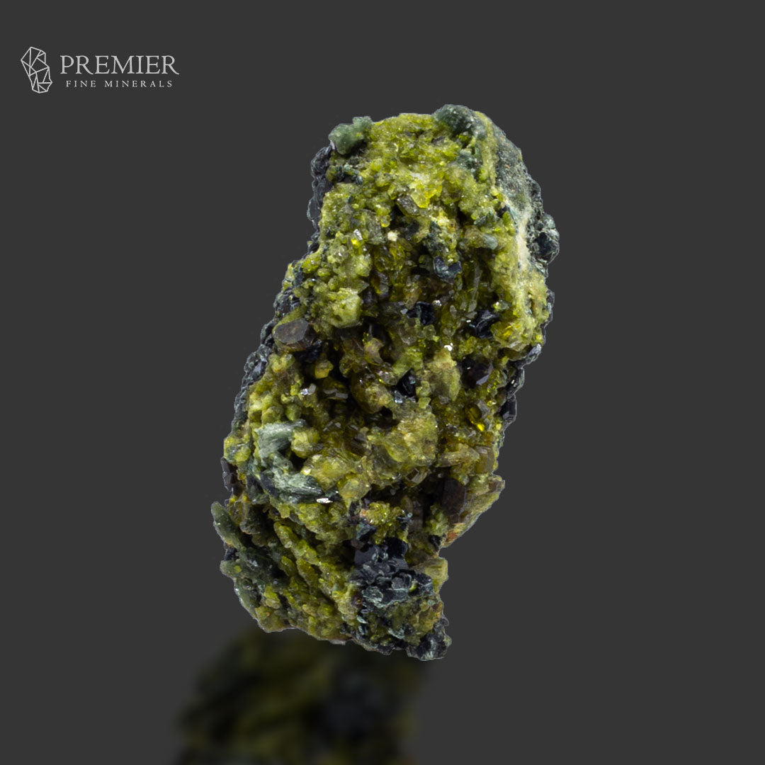 Vesuvianite, Diopside, Rainbow Magnetite and Biotite Cluster