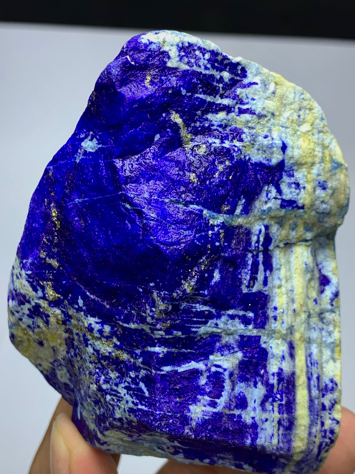 476g Lapis Lazuli block with golden Pyrite
Front view of large rough Lapis Lazuli piece
Bright Pyrite veining on dense Lapis Lazuli
Afghan Lapis Lazuli block, natural surface