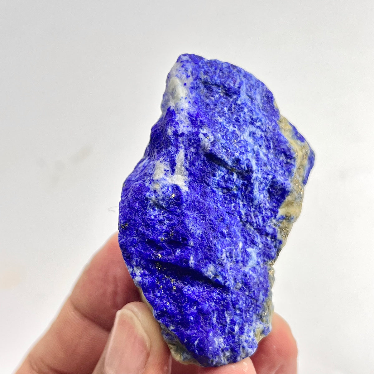 Close-up of Lazurite matrix showing indigo blue tone
Small Lapis Lazuli specimen, top view
Raw Lapis Lazuli showing natural Calcite pockets
Afghan Lapis Lazuli specimen, side profile view
80g raw Lapis Lazuli specimen with Pyrite flecks
Lapis Lazuli rough specimen, front angle, deep blue color
Close-up view of Pyrite flecks on Lapis Lazuli specimen