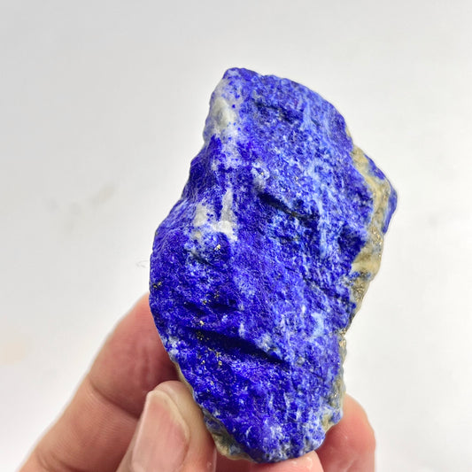 Close-up of Lazurite matrix showing indigo blue tone
Small Lapis Lazuli specimen, top view
Raw Lapis Lazuli showing natural Calcite pockets
Afghan Lapis Lazuli specimen, side profile view
80g raw Lapis Lazuli specimen with Pyrite flecks
Lapis Lazuli rough specimen, front angle, deep blue color
Close-up view of Pyrite flecks on Lapis Lazuli specimen