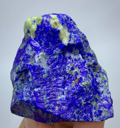 Raw Lapis lazuli crystal specimen with deep blue and white marbled patterns