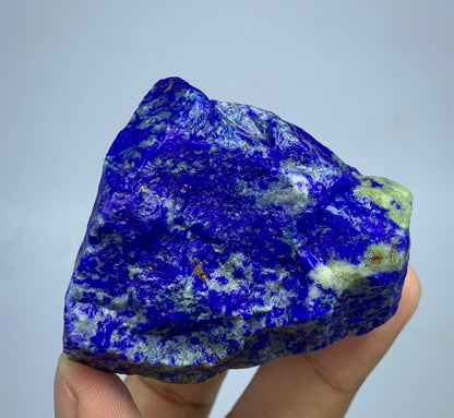 Raw Lapis lazuli crystal specimen with deep blue and white marbled patterns
