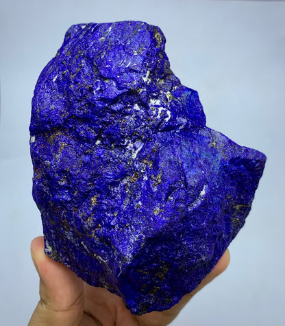 780g raw Lapis Lazuli specimen with Pyrite inclusions
Lapis Lazuli rough boulder, front angle, deep blue color
Close-up view of Pyrite veins on Lapis Lazuli specimen
Badakhshan Lapis Lazuli boulder, natural rough textur