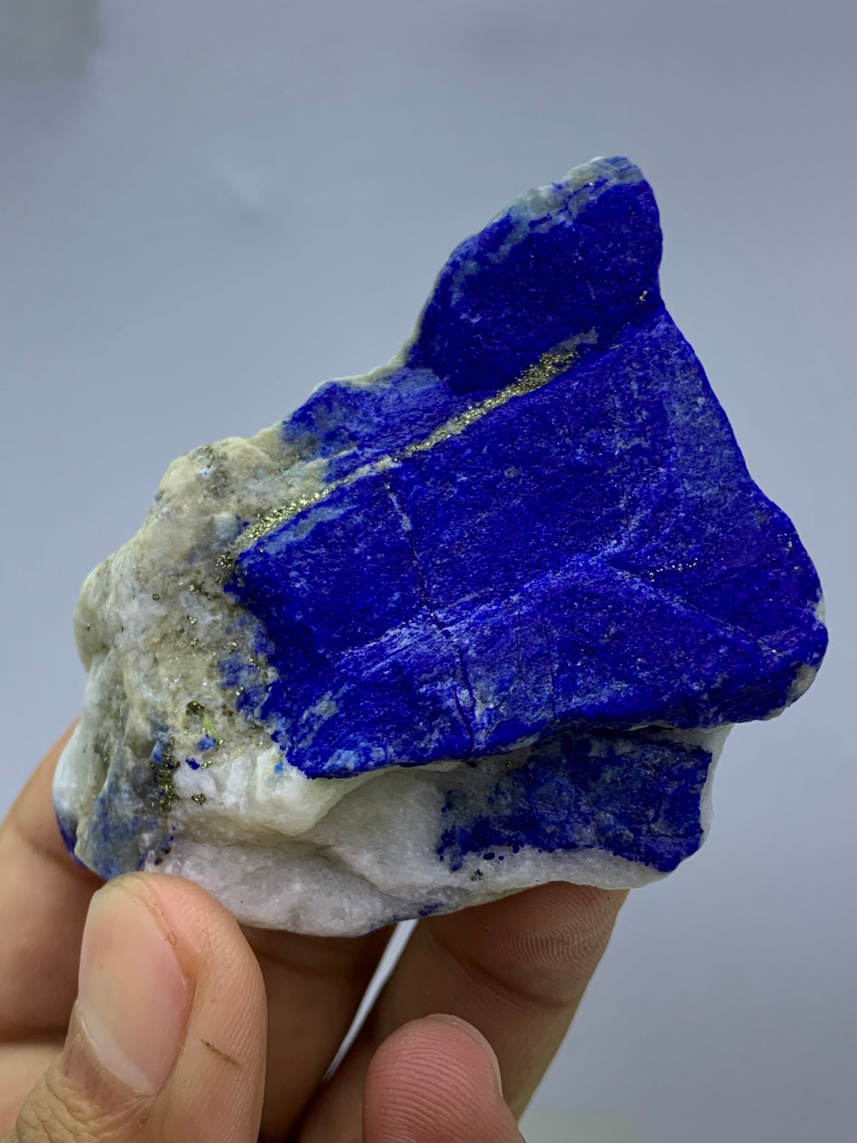 Close-up of Lazurite matrix showing indigo blue tone
Balanced Lapis Lazuli specimen, top view
Raw Lapis Lazuli showing natural Calcite pockets