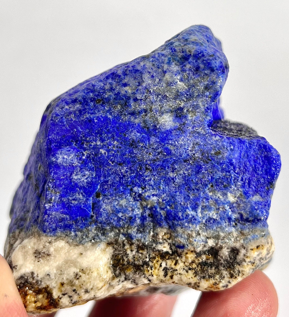 Chunky cube-form Lapis Lazuli specimen view
Boxy blue mineral piece from Badakhshan