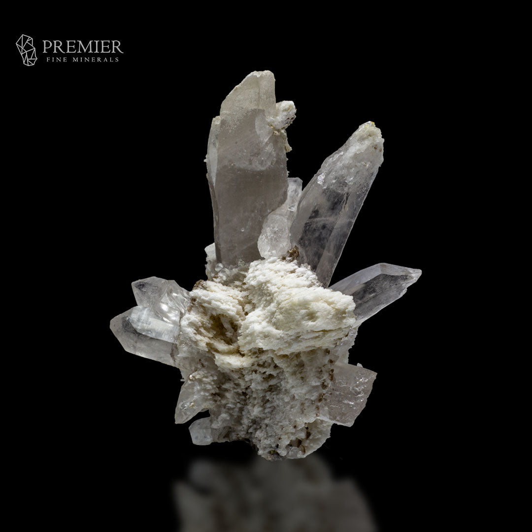 Close-up of etched, frosted Quartz crystal surface
Lemurian Quartz cluster, top view
Quartz crystal showing barcode growth striations