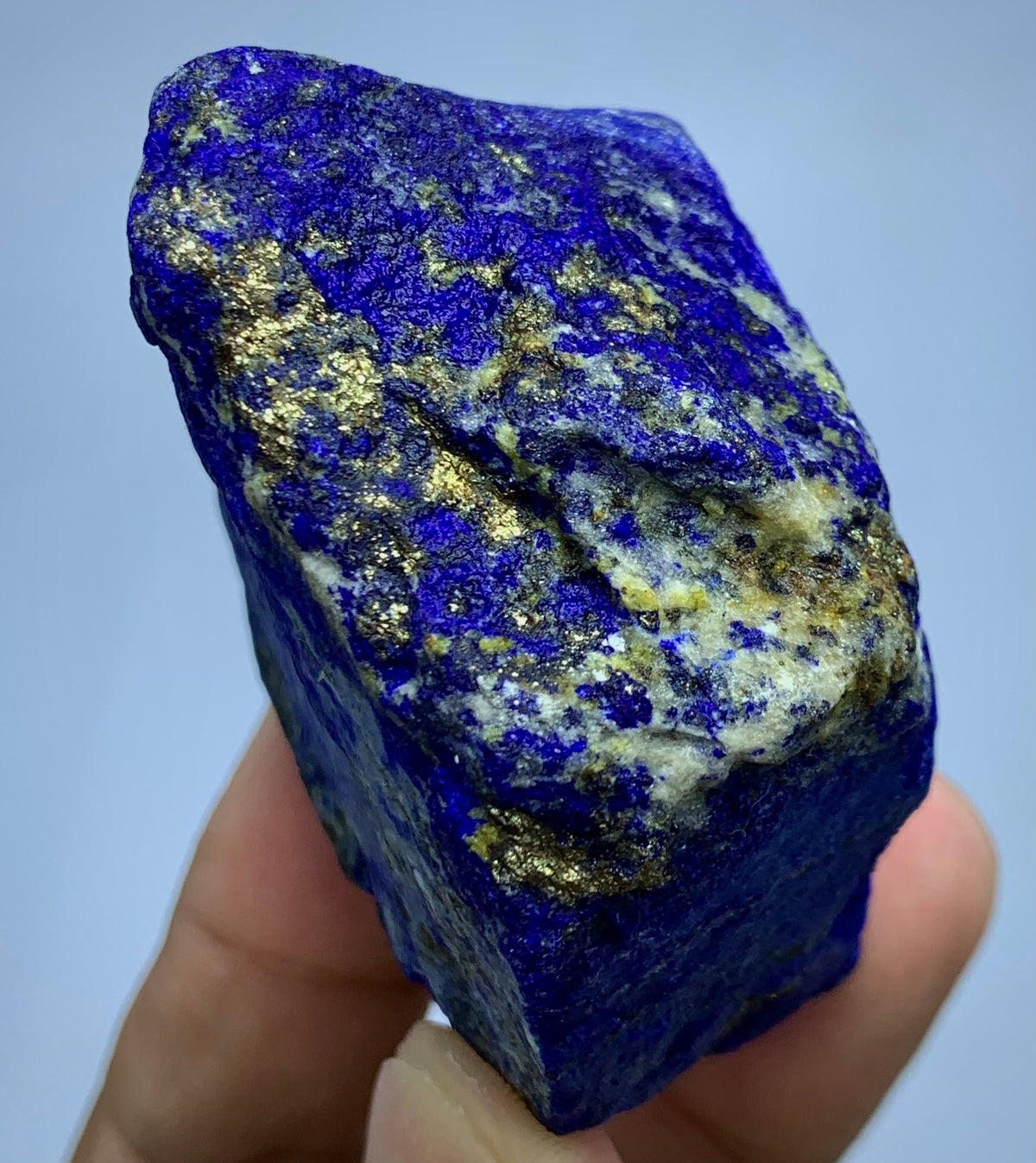 Raw Lapis Lazuli specimen showing white Calcite streaks
Afghan Lapis Lazuli, angled view highlighting depth
Compact Lapis Lazuli specimen, full piece overview
Detail shot of Lazurite blue coloring on rough specimen
174g Lapis Lazuli specimen with scale reference
Badakhshan Lapis Lazuli, close-up on Pyrite cluster
Boxy Lapis Lazuli specimen, bottom view
Afghan Lapis Lazuli, natural unpolished surface detail
Lapis Lazuli specimen displayed against neutral background