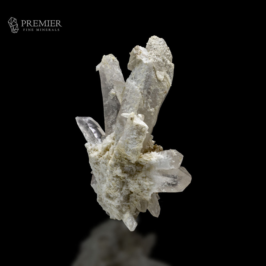 Feldspar matrix with Quartz crystal points
Quartz cluster showing translucent crystal points
Skardu Pakis