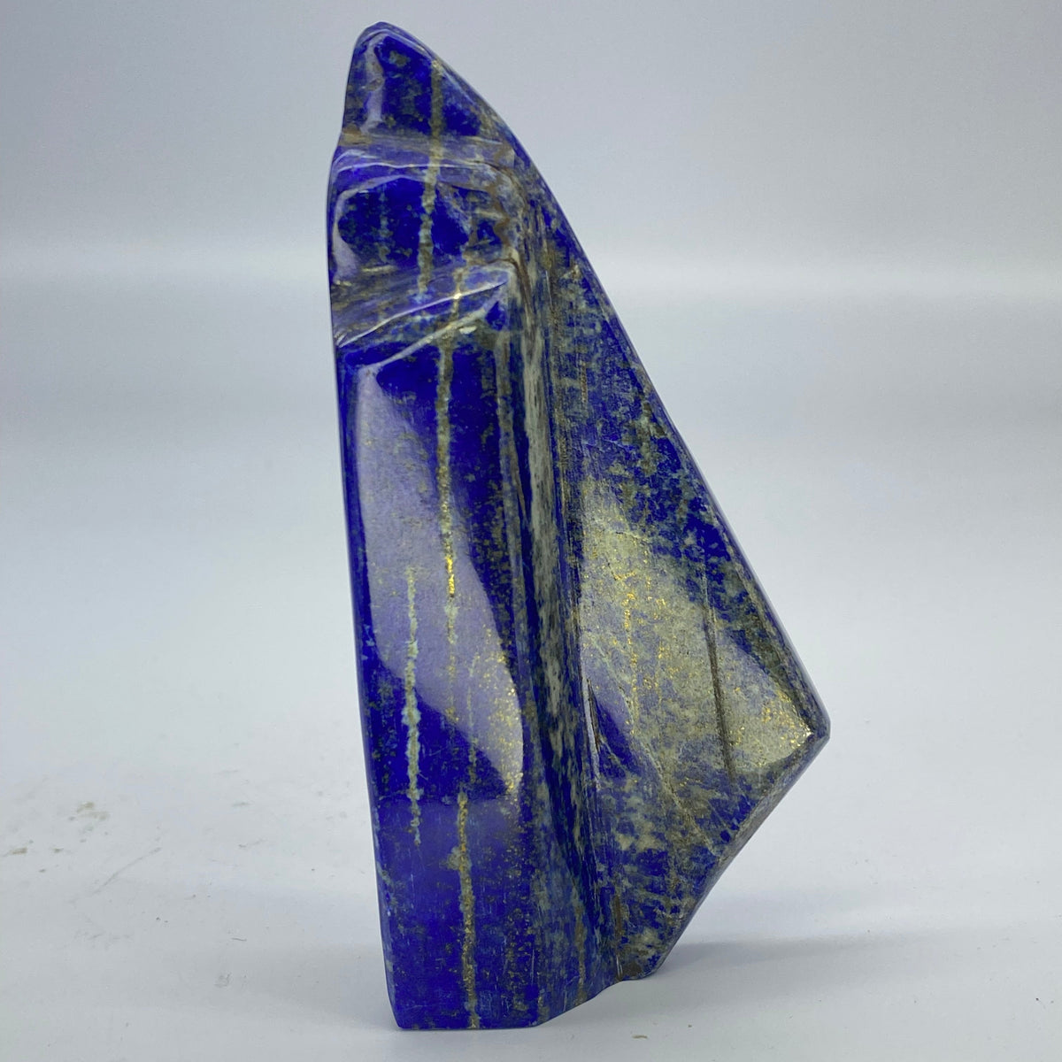 Gold pyrite running along blue Lapis Lazuli
Back side of 155g Badakhshan Lapis Lazuli freeform
