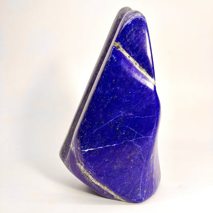 Golden Pyrite clouds on polished blue stone
Side profile showing thickness of Lapis Lazuli block