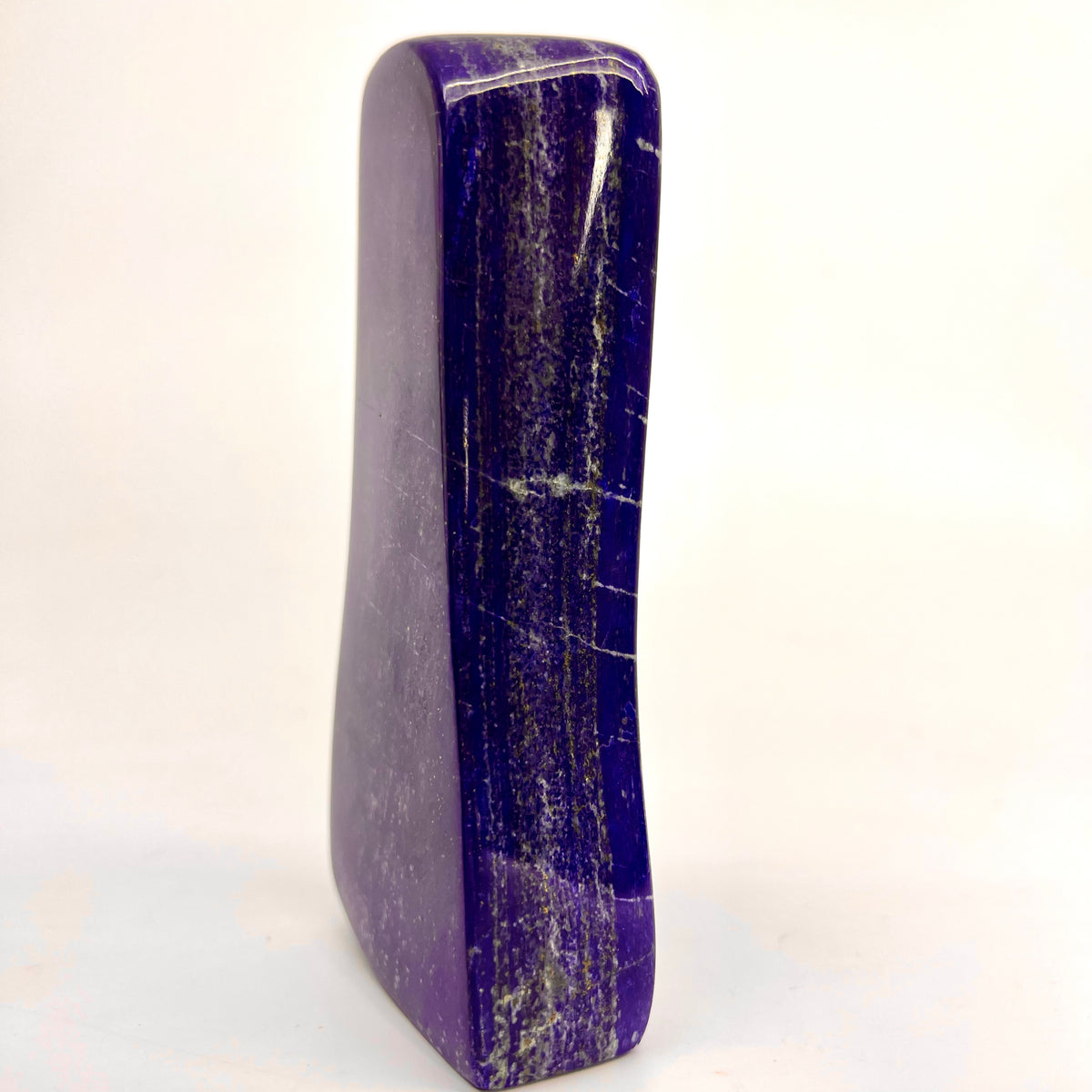Golden Pyrite streaks on high-shine blue stone
Side profile showing thickness of polished block