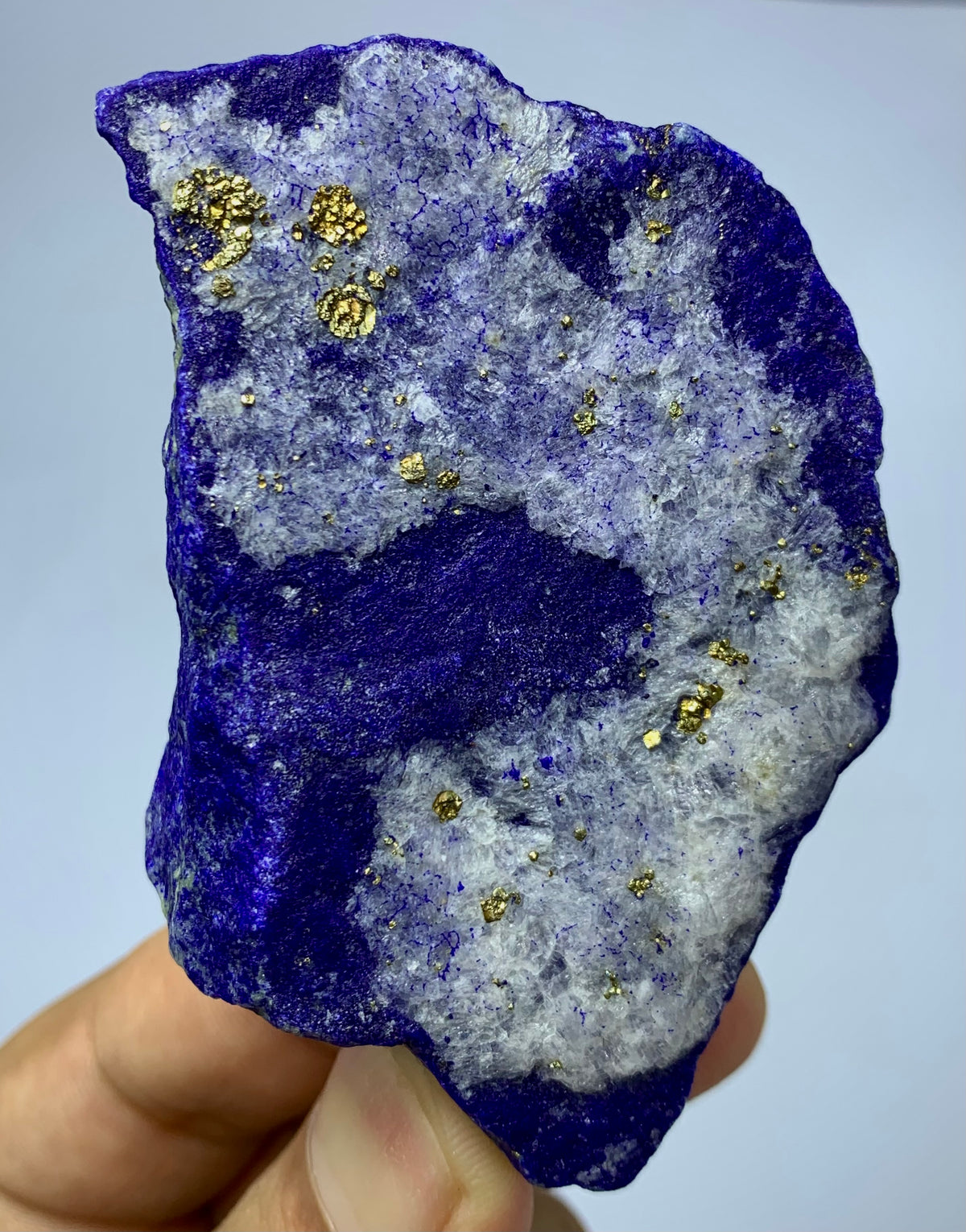 Indigo to ultramarine Lapis Lazuli specimen
Lapis Lazuli specimen for workspace display
Close-up of Pyrite flecks on Lapis Lazuli surface