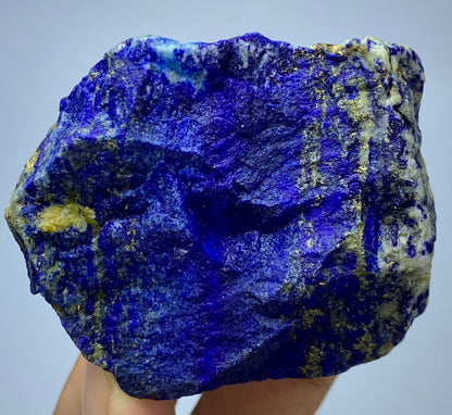 Raw Lapis Lazuli specimen showing white Calcite streaks
Afghan Lapis Lazuli, angled view highlighting depth
Lapis Lazuli blocky specimen, full piece overview
Detail shot of royal blue coloring on rough specimen
