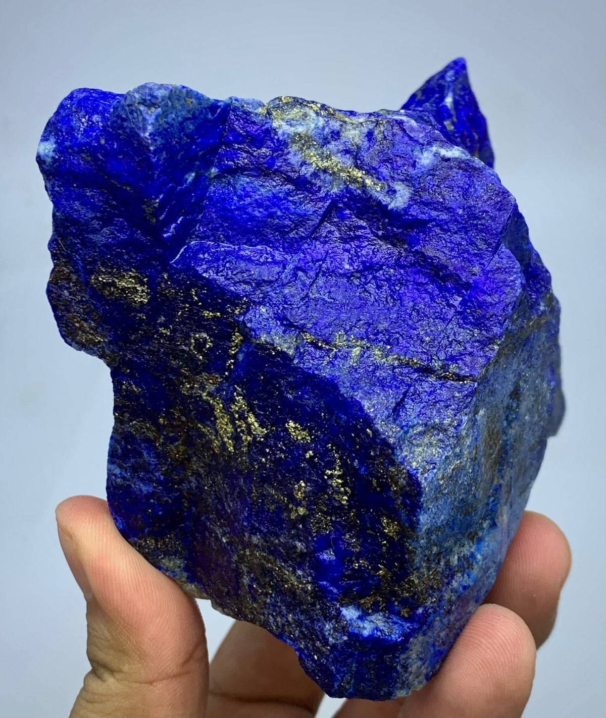 Lapis Lazuli boulder specimen, top view
Raw Lapis Lazuli showing natural Calcite pockets