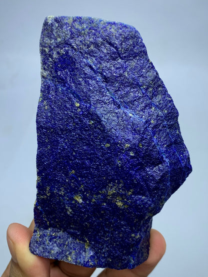 Lapis Lazuli elongated specimen, top view
Raw Lapis Lazuli showing natural Calcite pockets