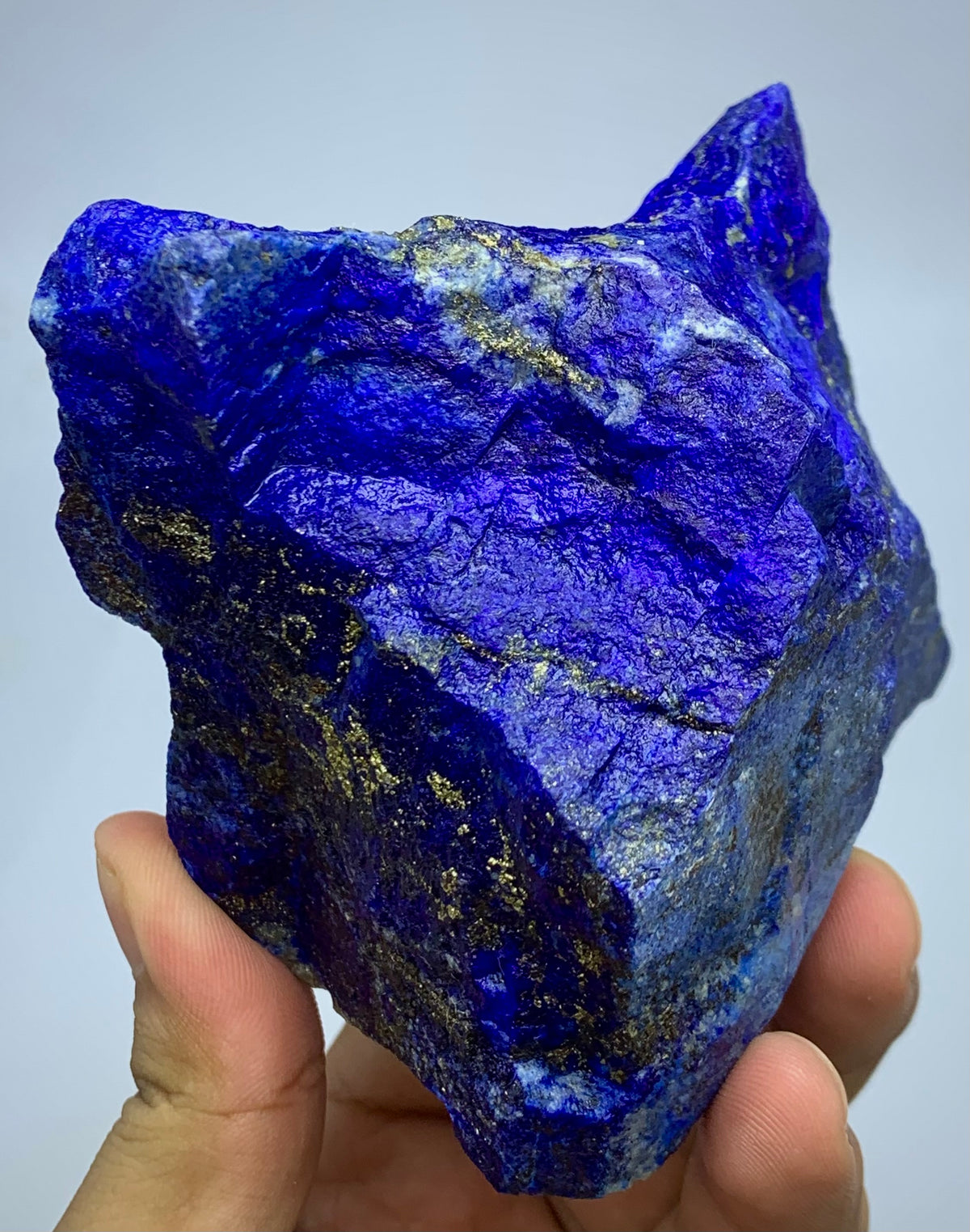 Afghan Lapis Lazuli specimen, side profile view
1kg raw Lapis Lazuli specimen with Pyrite inclusions
Lapis Lazuli rough boulder, front angle, deep blue color
Close-up view of Pyrite veins on Lapis Lazuli specimen
Badakhshan Lapis Lazuli boulder, natural rough 
