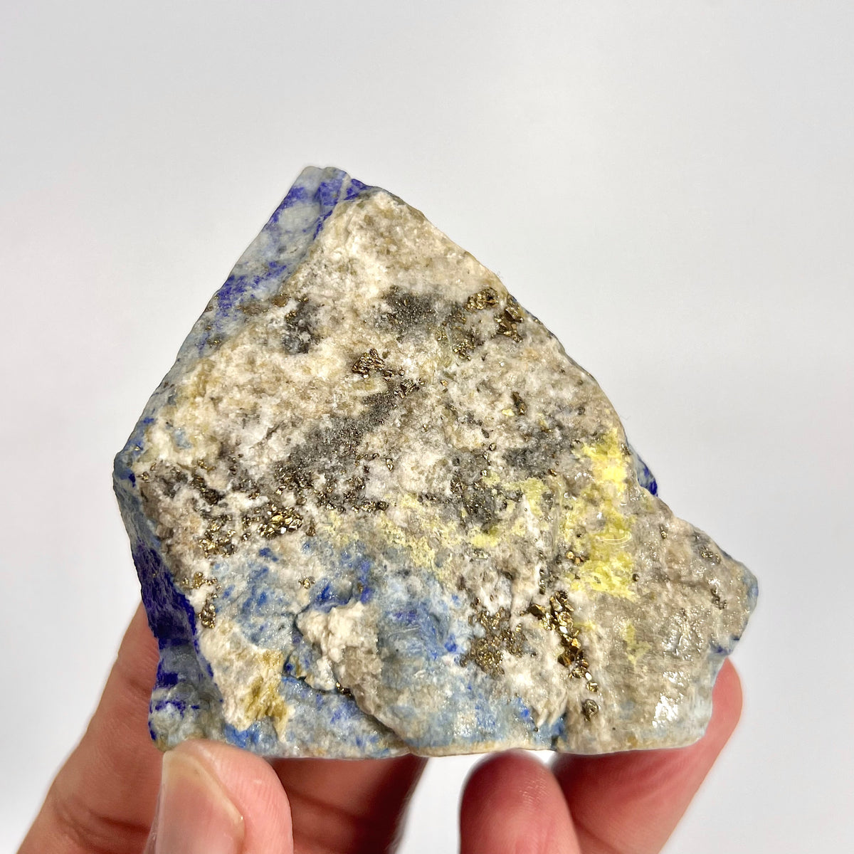 Lapis Lazuli specimen, angled view highlighting depth
Boxy Lapis Lazuli specimen, full piece overview