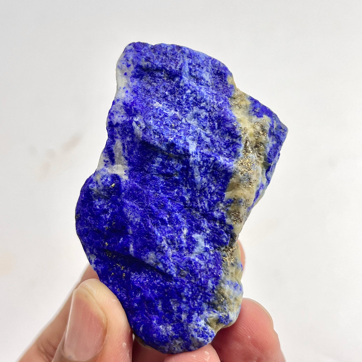 Raw Lapis Lazuli small specimen from Badakhshan
Compact Lapis Lazuli specimen with golden Pyrite flecks