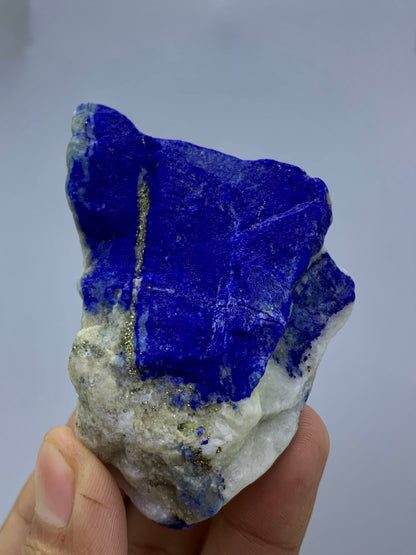 Raw royal blue Lapis Lazuli specimen from Badakhshan
Thick Lapis Lazuli cabinet specimen with golden Pyrite