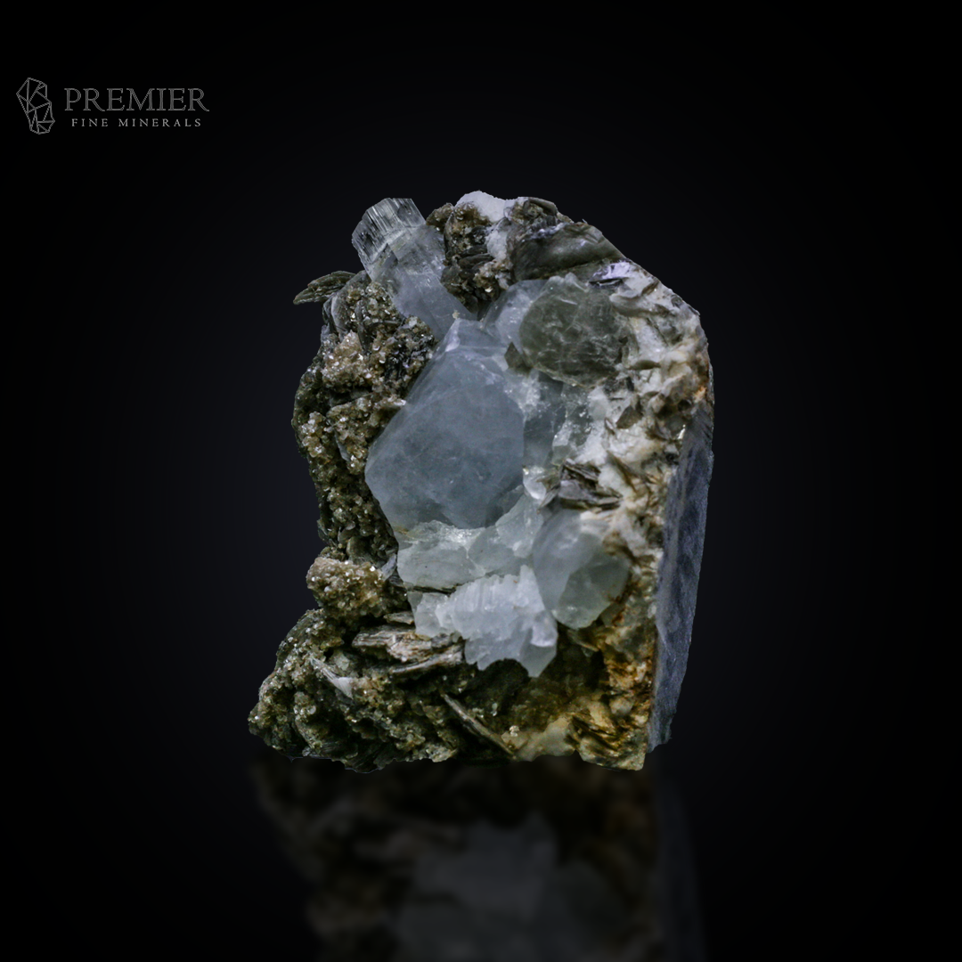 Beautiful 156 Gram (780 ct) Aquamarine crystal cluster on a shimmering Muscovite Mica matrix (66 x 47 x 37 mm) from Pakistan. Features exceptional blue-on-silver contrast.