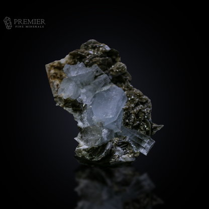 Beautiful 156 Gram (780 ct) Aquamarine crystal cluster on a shimmering Muscovite Mica matrix (66 x 47 x 37 mm) from Pakistan. Features exceptional blue-on-silver contrast.