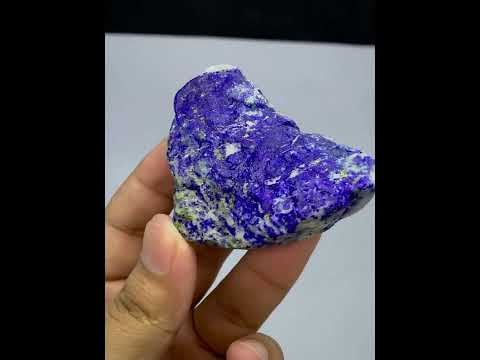 Heart-shaped lapis lazuli crystal with deep blue and purple coloration & gold pyrite flecks