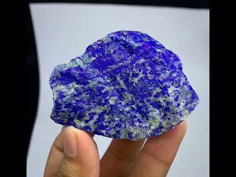 Raw Lapis lazuli crystal specimen with deep blue and white marbled patterns