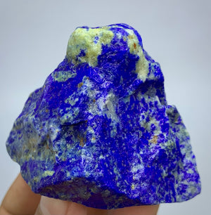 Raw Lapis lazuli crystal specimen with deep blue and white marbled patterns